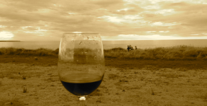 cropped wine in hand sepia